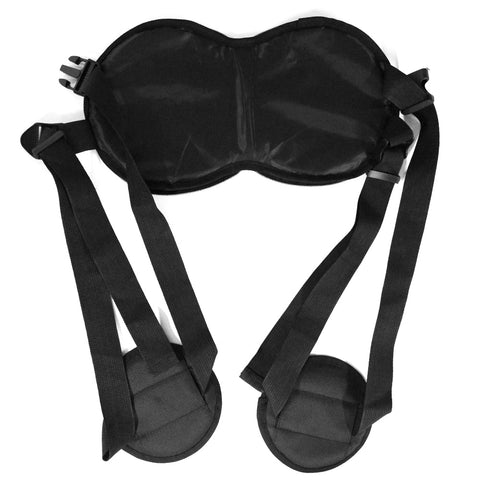 Image of Showing the seated posture correction brace, with lower back support and knee braces. 