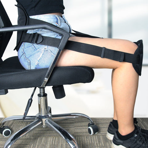 Image of The seated posture corrector brace is worn when seated, over the knees and lower back to correct and fix posture and reduce lower back pain.